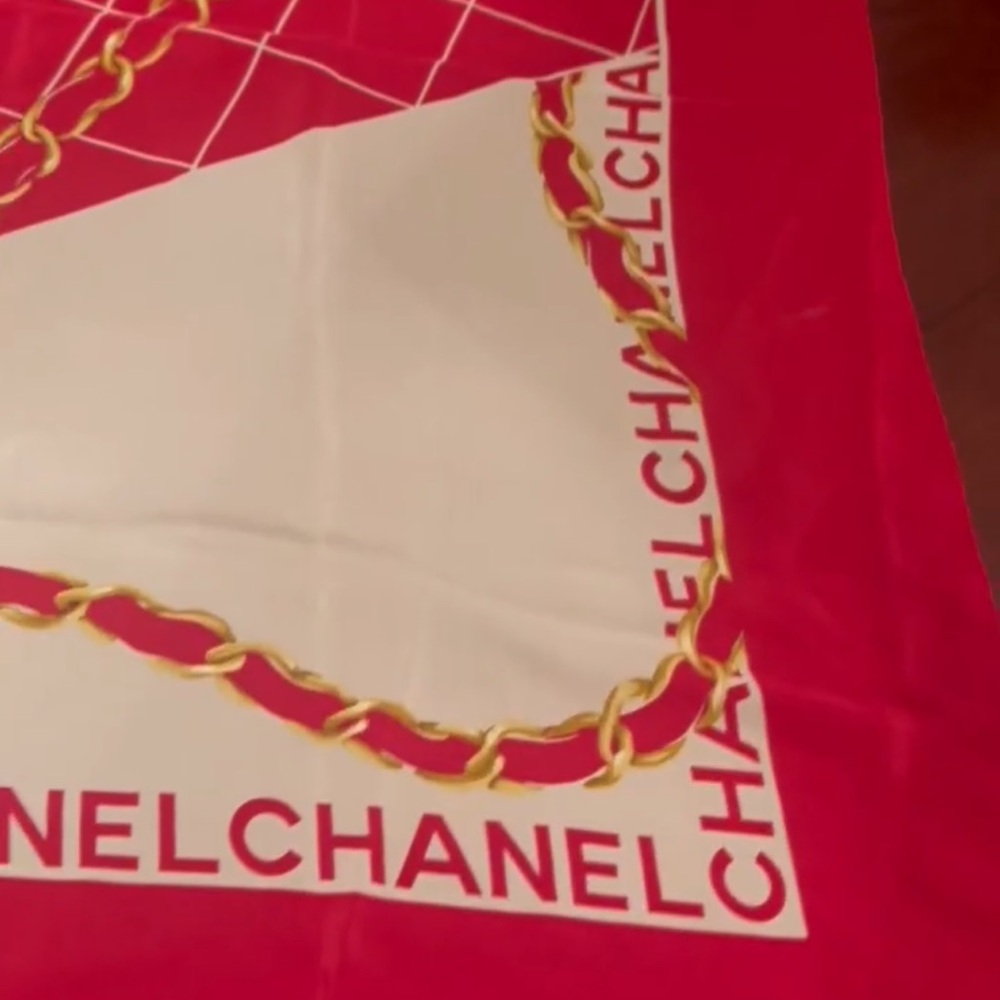 CHANEL Red and Gold Scarf with Iconic Chain Design